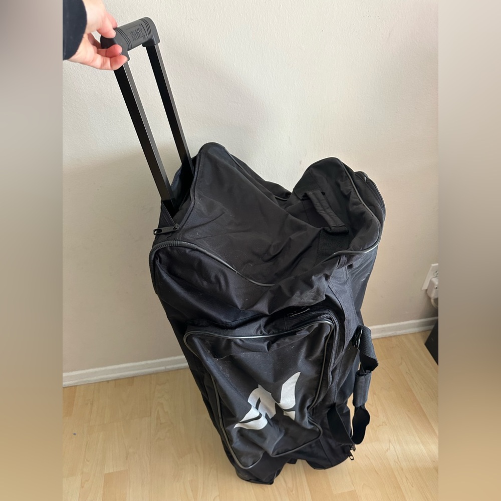 Fallen brand rolling duffle bag 33”x14”x 13” deep